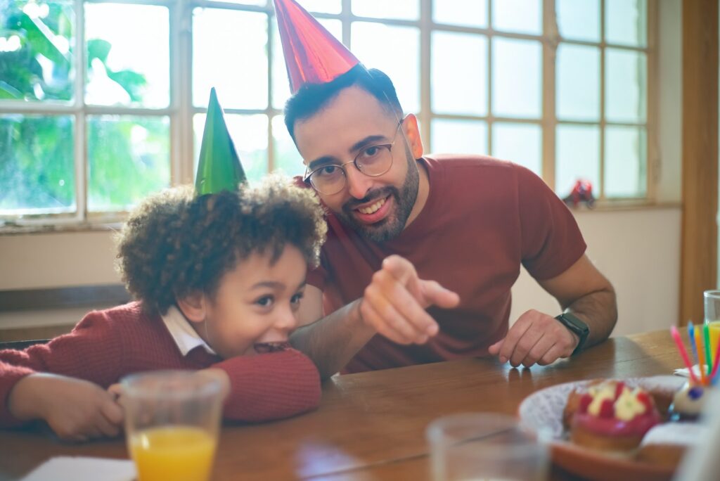 Father and Son Sitting at the Table